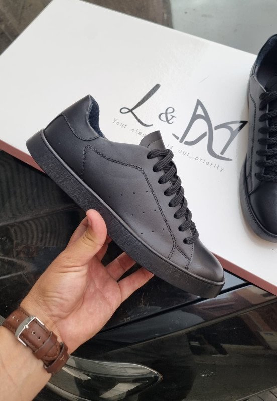 BASKETS BASSES  EN CUIR NOIR